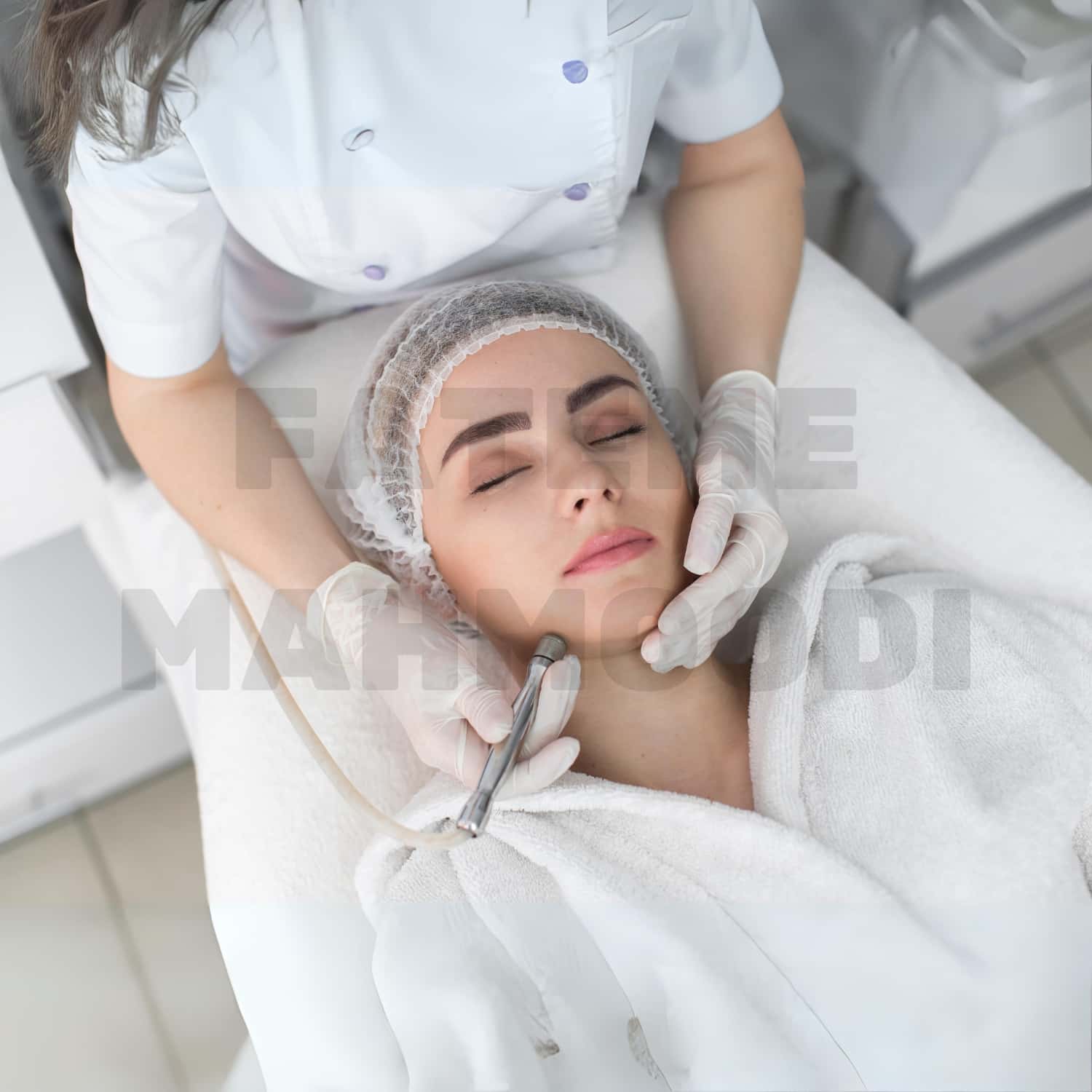 A woman recieving an super facial service